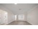 Bright living room with hardwood floors and neutral wall paint at 6750 W Flamingo S Way, St Petersburg, FL 33707