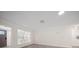 Bright and airy living room featuring recessed lighting and beautiful wood floors at 6750 W Flamingo S Way, St Petersburg, FL 33707