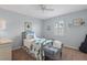Small bedroom with a single bed and window shutters at 10713 Cape Hatteras Dr, Tampa, FL 33615