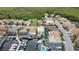 Drone view showcasing a waterfront community with lush landscaping and many boats at 10713 Cape Hatteras Dr, Tampa, FL 33615