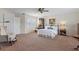 Bedroom with window shutters and comfortable seating at 10713 Cape Hatteras Dr, Tampa, FL 33615
