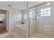 Bathroom with bathtub, shower, and tiled floor at 10713 Cape Hatteras Dr, Tampa, FL 33615