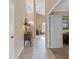 Bright and spacious entryway with tile flooring and a view of the living area at 10713 Cape Hatteras Dr, Tampa, FL 33615