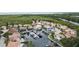 Wide aerial showcasing a neighborhood of luxury waterfront homes at 10713 Cape Hatteras Dr, Tampa, FL 33615