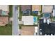 Aerial view of waterfront homes with private boat docks and pools at 10713 Cape Hatteras Dr, Tampa, FL 33615