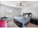 Spacious bedroom with a king-size bed and ample floor space at 35716 Hillbrook Ave, Zephyrhills, FL 33541