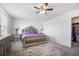 Spacious main bedroom with large closet and elegant furnishings at 35716 Hillbrook Ave, Zephyrhills, FL 33541