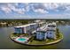 Aerial view of condo building and surrounding waterfront property at 5960 30Th S Ave # 502, Gulfport, FL 33707