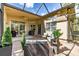 Large screened patio with brick pavers and grill at 5014 Ruby Flats Dr, Wimauma, FL 33598