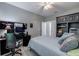 Versatile bedroom with built-in shelving and home office at 5014 Ruby Flats Dr, Wimauma, FL 33598