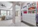 Large walk-in closet with custom shelving and drawers at 5014 Ruby Flats Dr, Wimauma, FL 33598