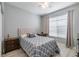 Comfortable bedroom with a queen bed and built-in workspace at 5014 Ruby Flats Dr, Wimauma, FL 33598