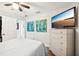 Serene bedroom with a comfy bed and large TV at 2419 Roxbury Cir, North Port, FL 34287