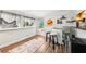Home bar with mini fridge and seating for three, near back door at 2419 Roxbury Cir, North Port, FL 34287