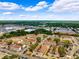 Aerial view of apartment buildings, showing the layout and surrounding area at 1264 E 113Th Ave # J204, Tampa, FL 33612