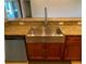 Kitchen with farmhouse sink and granite countertops at 132 Peckham Se St, Port Charlotte, FL 33952