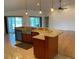 Modern kitchen with granite countertops and stainless steel appliances at 132 Peckham Se St, Port Charlotte, FL 33952
