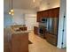 Modern kitchen with stainless steel appliances and granite counters at 132 Peckham Se St, Port Charlotte, FL 33952