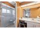 Bathroom with shower, vanity, and toilet at 8227 Rhanbuoy Rd, Spring Hill, FL 34606