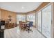Breakfast nook features a table, chairs, and access to the outdoors at 8227 Rhanbuoy Rd, Spring Hill, FL 34606