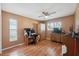 Bright bedroom with wood floors and built-in storage at 8227 Rhanbuoy Rd, Spring Hill, FL 34606