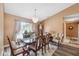Formal dining room with wood table and chairs at 8227 Rhanbuoy Rd, Spring Hill, FL 34606