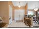 Bright entryway with tile floors and double doors at 8227 Rhanbuoy Rd, Spring Hill, FL 34606