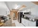 Modern kitchen with stainless steel appliances and granite countertops at 8227 Rhanbuoy Rd, Spring Hill, FL 34606