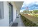 Hallway of condo building with American flag at 8320 112Th St # 104, Seminole, FL 33772
