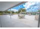 Relaxing covered patio with seating and scenic views at 8320 112Th St # 104, Seminole, FL 33772