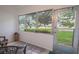 Sunroom with view of the community's green space at 8320 112Th St # 104, Seminole, FL 33772