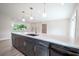 Modern kitchen with large island and stainless steel appliances at 1227 Arden Ave, Clearwater, FL 33755
