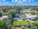 Aerial view showcasing a remodeled home and its expansive backyard at 1227 Arden Ave, Clearwater, FL 33755