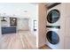 Modern laundry room with stacked washer and dryer at 1227 Arden Ave, Clearwater, FL 33755
