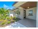 Modern home front porch with brick facade and landscaping at 1227 Arden Ave, Clearwater, FL 33755