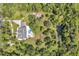 Bird's eye view of house, pool, and expansive property at 6775 Timberland Ln, Sarasota, FL 34241
