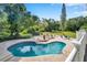 Large kidney-shaped pool with ample deck space at 6775 Timberland Ln, Sarasota, FL 34241