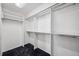 Large walk-in closet with ample shelving and hanging space at 6775 Timberland Ln, Sarasota, FL 34241