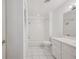 Clean bathroom with a bathtub, shower, and double vanity at 6775 Timberland Ln, Sarasota, FL 34241