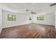 Spacious bedroom with hardwood floors and large windows at 6775 Timberland Ln, Sarasota, FL 34241