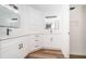 Modern bathroom with white cabinets and black fixtures at 2156 Masters Ct # 2156, Dunedin, FL 34698