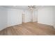 Spacious bedroom featuring laminate flooring and neutral walls at 2156 Masters Ct # 2156, Dunedin, FL 34698