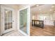 Modern kitchen with island and sliding door to patio at 2156 Masters Ct # 2156, Dunedin, FL 34698