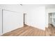 Bright bedroom with double door closet and hardwood floors at 2156 Masters Ct # 2156, Dunedin, FL 34698