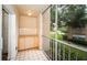 Covered screened balcony with outdoor storage cabinet at 2156 Masters Ct # 2156, Dunedin, FL 34698