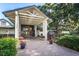 Attractive building entrance with covered walkway and landscaping at 2156 Masters Ct # 2156, Dunedin, FL 34698