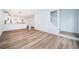 Open concept living area with kitchen and stairs at 2156 Masters Ct # 2156, Dunedin, FL 34698