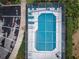 Overhead view of refreshing community pool with patio furniture at 2156 Masters Ct # 2156, Dunedin, FL 34698
