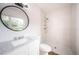Clean bathroom with a shower/tub combo and a modern vanity at 2156 Masters Ct # 2156, Dunedin, FL 34698