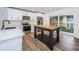 Modern kitchen with island and stainless steel appliances at 2156 Masters Ct # 2156, Dunedin, FL 34698